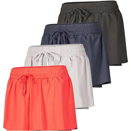Real Essentials 4 Pack: Womens Flowy Dry Fit Running Short - Gym Yoga Workout Summer Shorts (Available in plus Size)