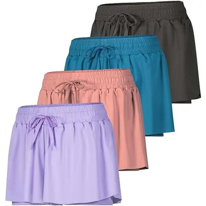 Real Essentials 4 Pack: Womens Flowy Dry Fit Running Short - Gym Yoga Workout Summer Shorts (Available in plus Size)