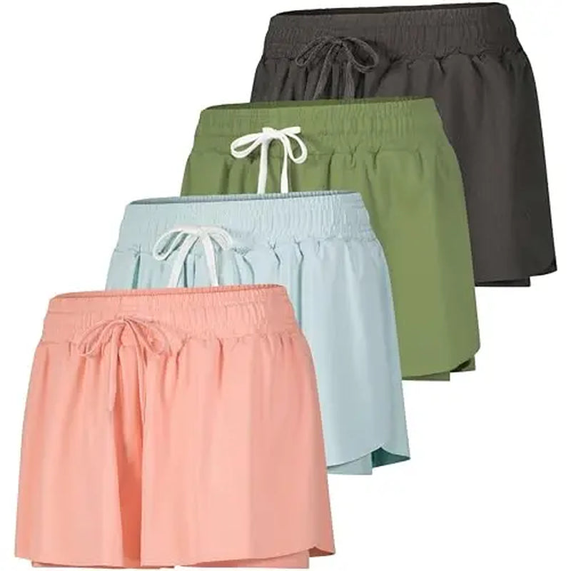 Real Essentials 4 Pack: Womens Flowy Dry Fit Running Short - Gym Yoga Workout Summer Shorts (Available in plus Size)